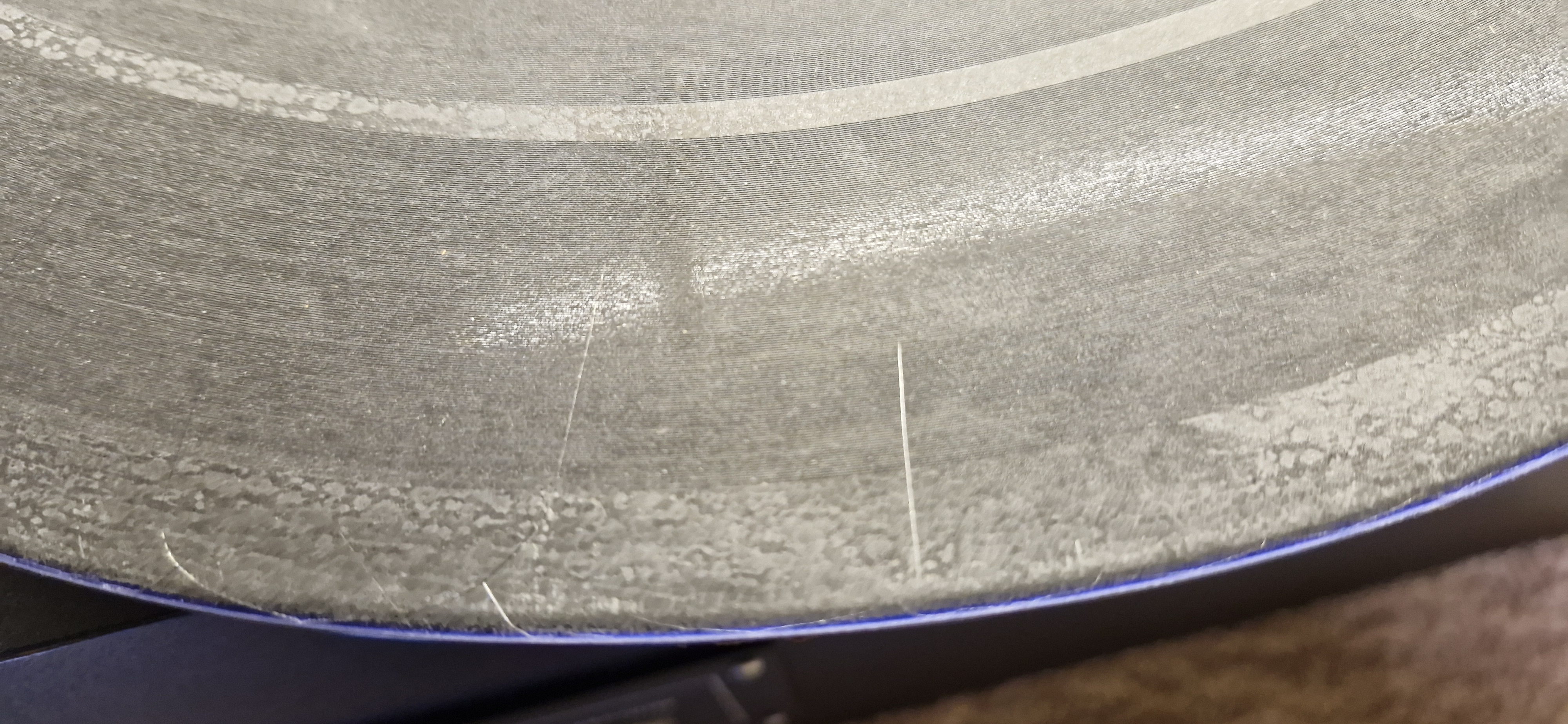 Cracks and surface damage on an acetate disc